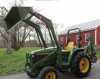 Traktor John Deere 4710 nakladačem